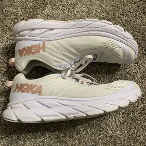 Hoka white athletic shoe